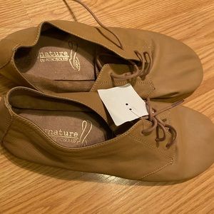 Tan lace up soft leather loafers (with soft shell on top) with hard soli…